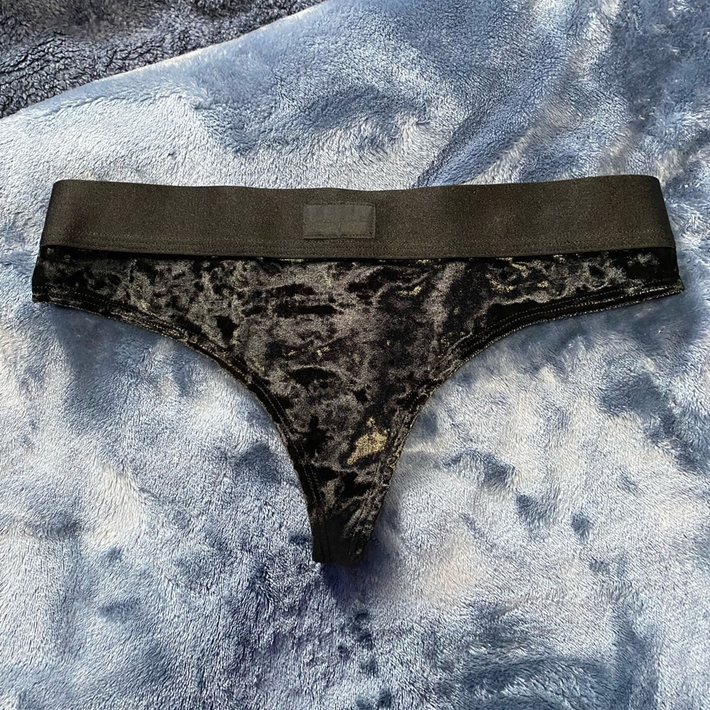 ** Black velvet thong